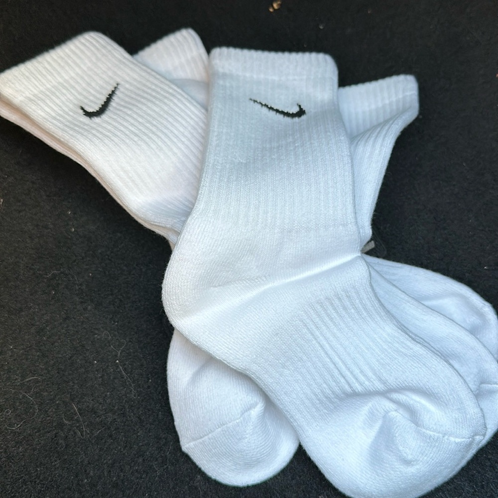 3 pairs of crew Nike socks. Never worn. I just ordered the wrong size.